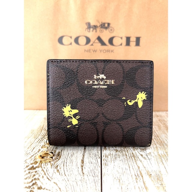 大人気✨ スナップウォレット ウッドストック柄 COACH×PEANUTS