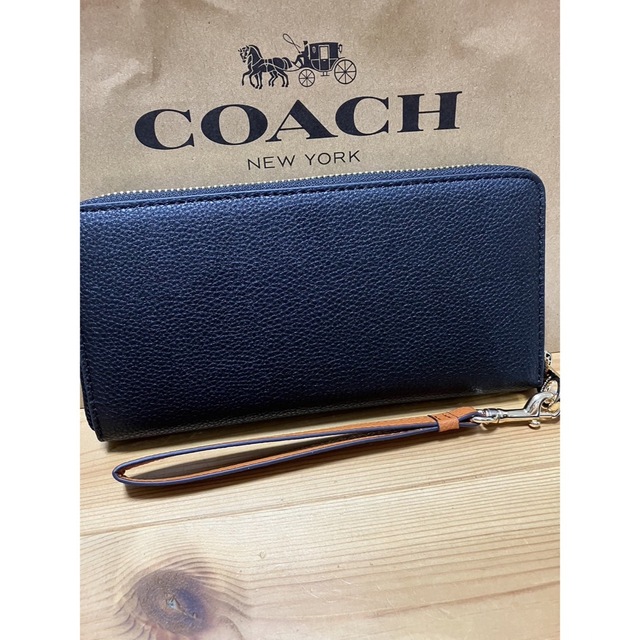 COACH(コーチ)の長財布 アウトレットCOACH ブラック系 馬車 レッド ストラップ 新品未使用 メンズのファッション小物(長財布)の商品写真