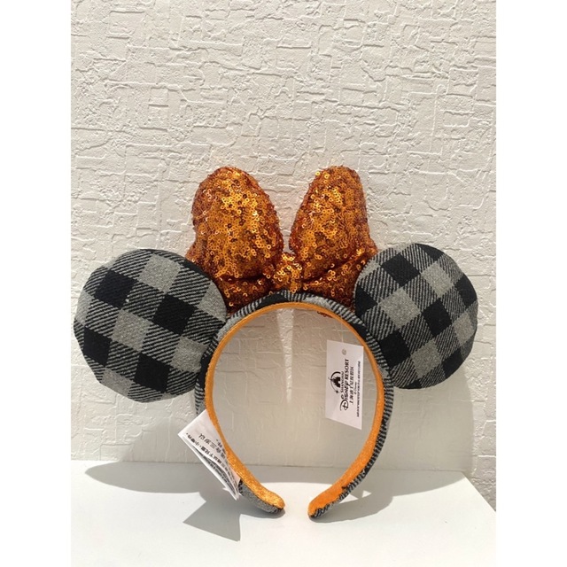 Disney(ディズニー)のディズニーカチューシャ　スパンコール　チェック　　オレンジ　海外  レディースのヘアアクセサリー(カチューシャ)の商品写真