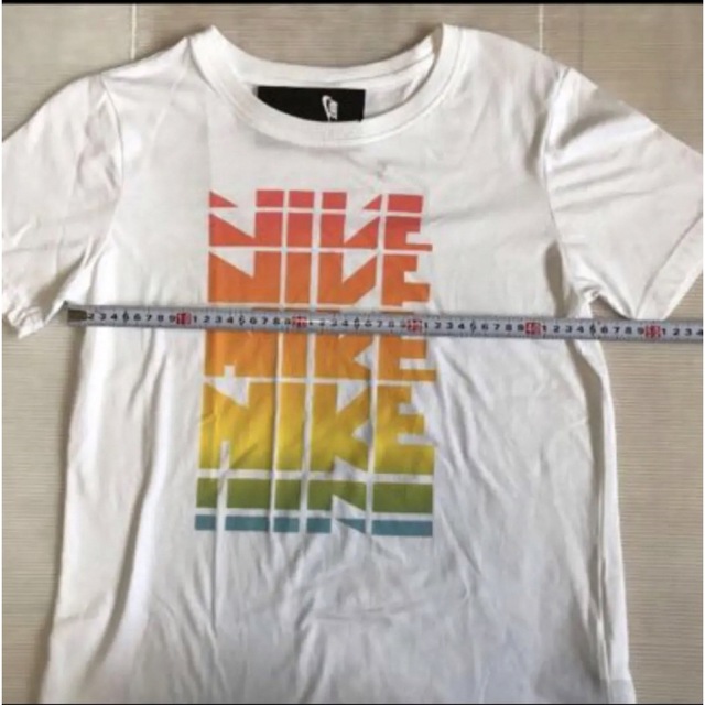 NIKE(ナイキ)の送料無料 新品 ナイキ ウィメンズ WC Tシャツ  L レディースのトップス(Tシャツ(半袖/袖なし))の商品写真