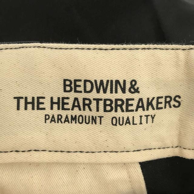 BEDWIN(ベドウィン)の【美品】  BEDWIN &THE HEARTBREAKERS / ベドウィン | 2022SS | × ANTI COUNTRY CLUB Ex. DICKIES 9L T/C PANTS TRIPSTER THUNDERS トリップスター サンダース ロゴ 刺繍 9分丈 チノ パンツ | 1 | BLACK | メンズ メンズのパンツ(その他)の商品写真