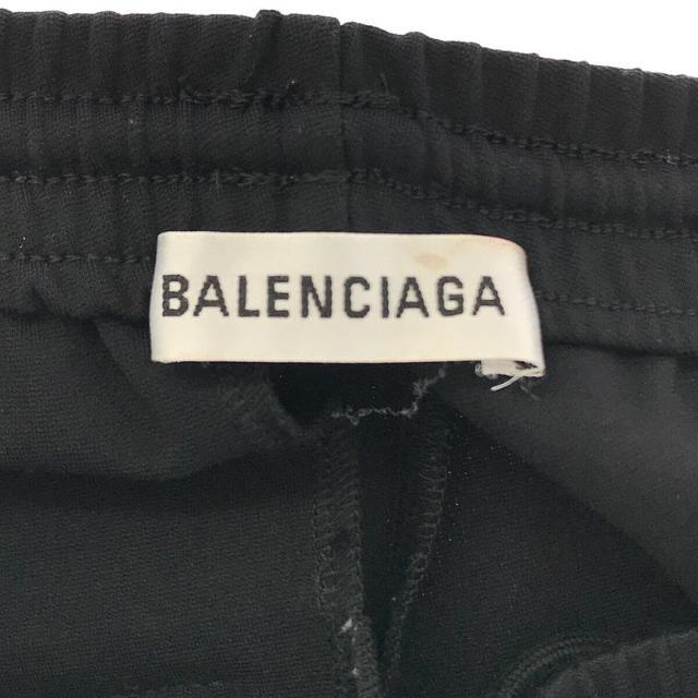 Balenciaga(バレンシアガ)の【美品】  BALENCIAGA / バレンシアガ | SIDE STRIPE TRACK PANTS サイド ストライプ ロゴ ジャージ トラック パンツ  595008 | 34 | ブラック | メンズ メンズのパンツ(その他)の商品写真