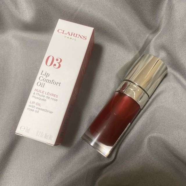 CLARINS(クラランス)のクラランス　コンフォートリップオイル　7ml  03 チェリー コスメ/美容のベースメイク/化粧品(リップグロス)の商品写真