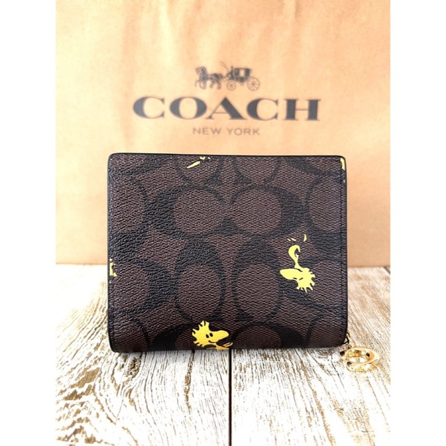 送料無料価格 人気！COACH コーチ×スヌーピー コラボ 二つ折り財布