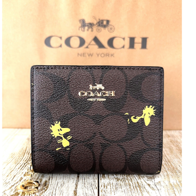 大人気✨ スナップウォレット ウッドストック柄 COACH×PEANUTS