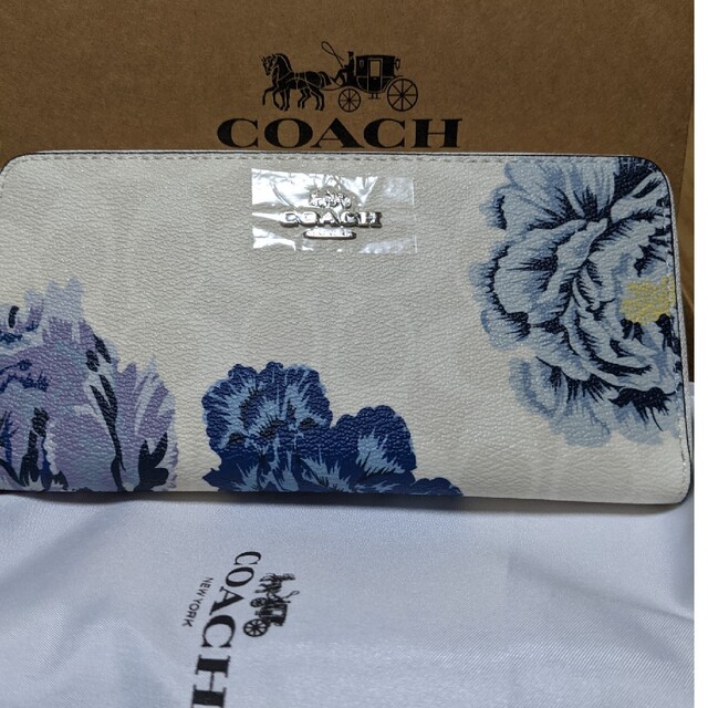 レディースCOACH 長財布 白系シグネチャー青い大きな花柄 - 財布