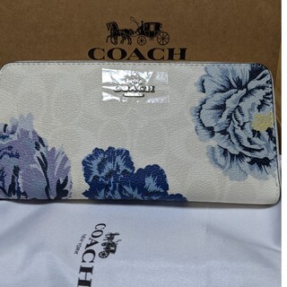 コーチ(COACH)のCOACH  長財布　白系シグネチャー　青い大きな花柄(財布)
