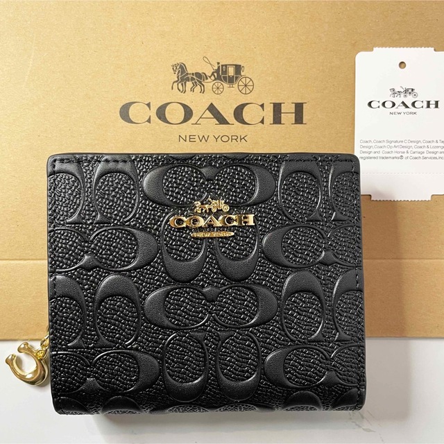 COACH - COACH シグネチャー エンボス加工 2つ折り財布 ブラックの通販