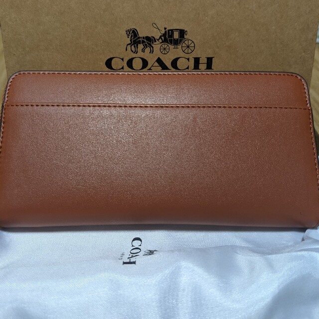 COACH(コーチ)のCOACH  長財布　ラウンドファスナー　スヌーピーブラウン レディースのファッション小物(財布)の商品写真