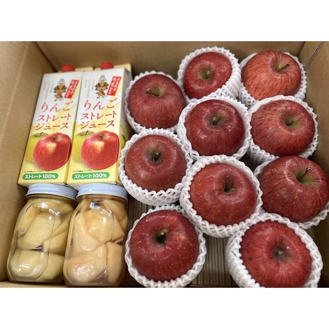 くまちゃん様専用♥︎︎∗︎*ﾟ　りんご＆ジュース2本＆桃の瓶詰めセット 食品/飲料/酒の食品(フルーツ)の商品写真