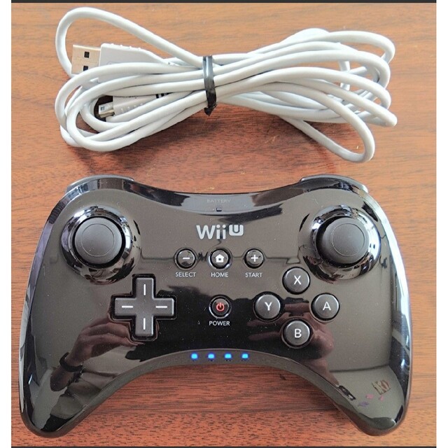 Wii U(ウィーユー)の【純正品】WIIU プロコン　黒　WUP-005 エンタメ/ホビーのゲームソフト/ゲーム機本体(その他)の商品写真