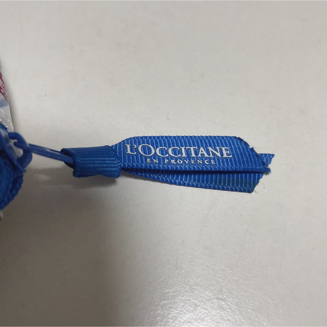 L'OCCITANE(ロクシタン)のL'OCCITANE ロクシタン ハンドクリーム柄 ポーチ マルチポーチ レディースのファッション小物(ポーチ)の商品写真