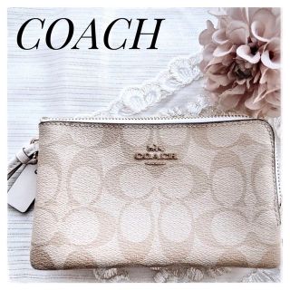 コーチ(COACH)の美品 COACH ポーチ 小物入れ リストレット ホワイト系 シグネチャー(ポーチ)