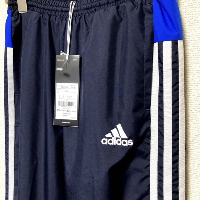 adidas(アディダス)の【新品】adidas アディダス 子供 ウィンドーパンツ   ウエア 130cm キッズ/ベビー/マタニティのキッズ服男の子用(90cm~)(パンツ/スパッツ)の商品写真