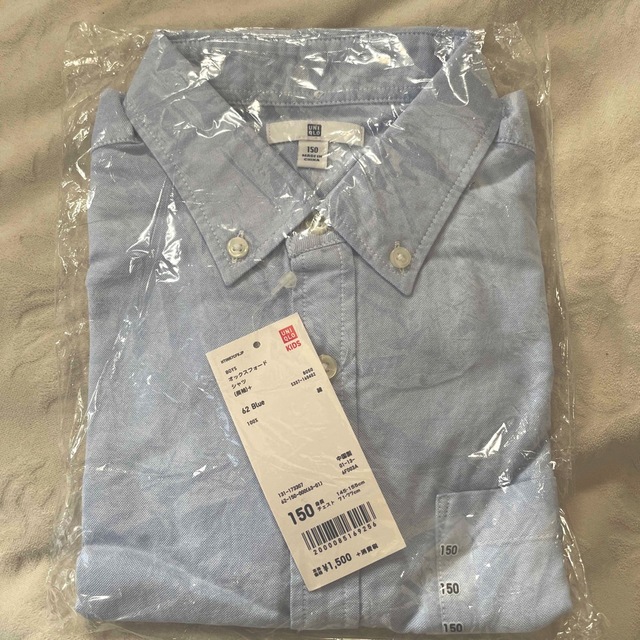 UNIQLO(ユニクロ)の値下げ！新品未使用　UNIQLOキッズ150 長袖オックスフォードシャツ キッズ/ベビー/マタニティのキッズ服男の子用(90cm~)(ブラウス)の商品写真