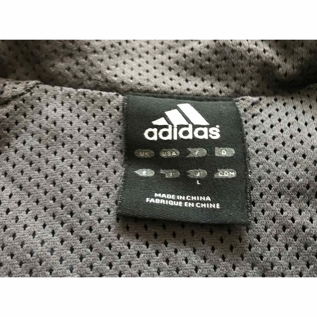 adidas(アディダス)のアディダス　adidas  シャカシャカ上下セット　防寒着　Lサイズ スポーツ/アウトドアのサッカー/フットサル(ウェア)の商品写真