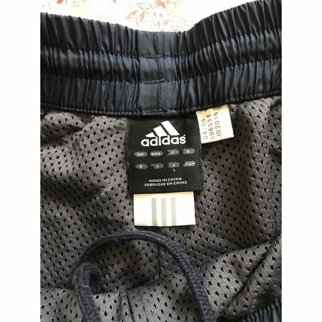 adidas(アディダス)のアディダス　adidas  シャカシャカ上下セット　防寒着　Lサイズ スポーツ/アウトドアのサッカー/フットサル(ウェア)の商品写真