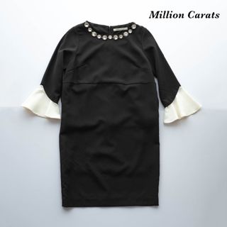 ミリオンカラッツ(Million Carats)の【美品】ミリオンカラッツ　カフスフレアビジューワンピース　黒　ブラック(ミニワンピース)