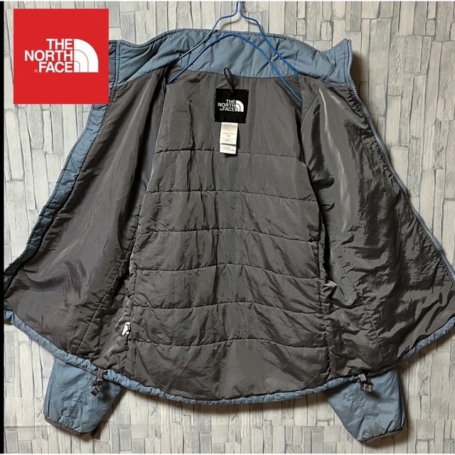 THE NORTH FACE(ザノースフェイス)のノースフェイス 水色 薄手ダウンナイロンジャケット ジップアップ スカイブルー色 レディースのジャケット/アウター(ナイロンジャケット)の商品写真