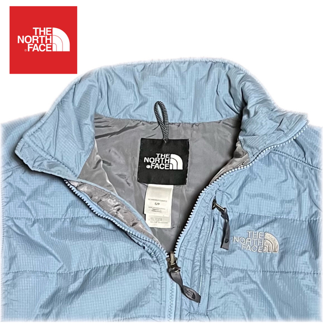 THE NORTH FACE(ザノースフェイス)のノースフェイス 水色 薄手ダウンナイロンジャケット ジップアップ スカイブルー色 レディースのジャケット/アウター(ナイロンジャケット)の商品写真