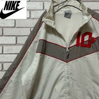 ナイキ(NIKE)の古着 NIKE コットンジャケット FOOTBALL ロゴワッペン ベージュL(ブルゾン)