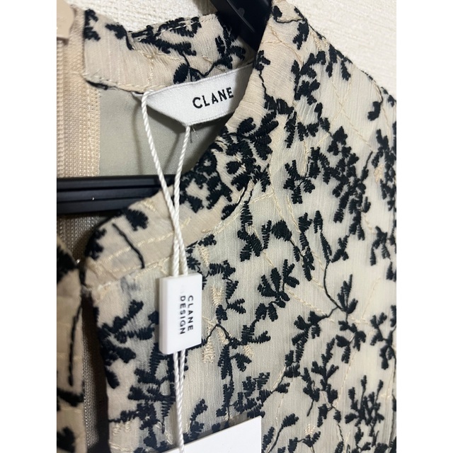 clane floret embroidery arm onepiece