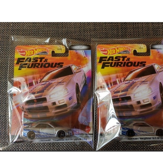 ホットウィール スカイライン GT-R R34 2台セット エンタメ/ホビーのおもちゃ/ぬいぐるみ(ミニカー)の商品写真