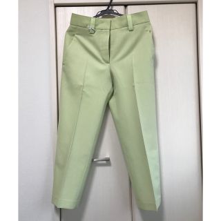 アクネ イエローグリーン パンツ - カジュアルパンツ