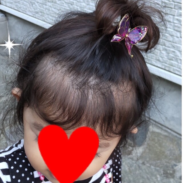 ヘアゴム　蝶々　レジン ハンドメイドのアクセサリー(ヘアアクセサリー)の商品写真