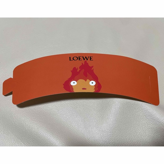 LOEWE(ロエベ)の【非売品】ロエベ LOEWE スリーブ　ハウルの動く城　カルシファー エンタメ/ホビーのおもちゃ/ぬいぐるみ(キャラクターグッズ)の商品写真