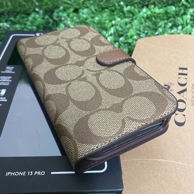 ★新品★COACH(コーチ)iPhone13proケースシグネチャー箱付き