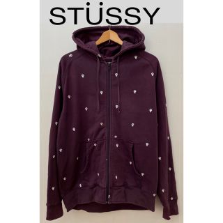 ステューシー(STUSSY)のSTUSSYステューシー　ジップアップパーカー　スカル　総柄　パープル　L(パーカー)