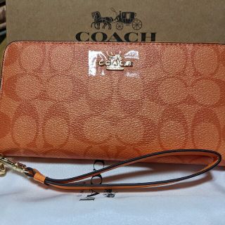 コーチ(COACH)のCOACH  長財布　シグネチャー　オレンジ(財布)