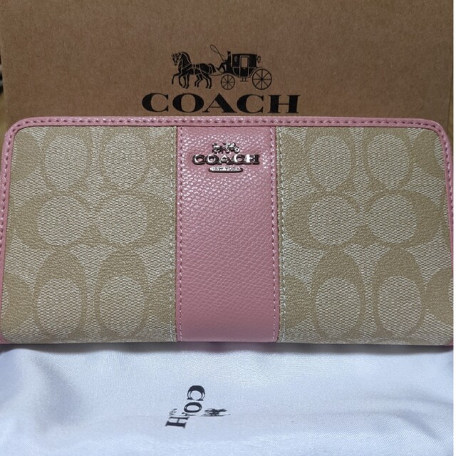 COACH  長財布　シグネチャー　ピンクのワンポイントレディース