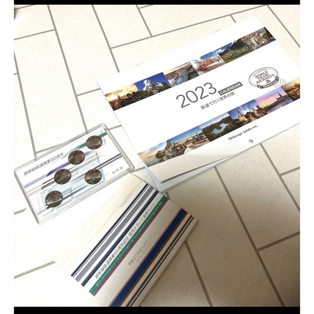 オークラヤ住宅 鉄道で行く世界の旅　壁掛けカレンダー  クラッド貨幣セット エンタメ/ホビーの美術品/アンティーク(貨幣)の商品写真