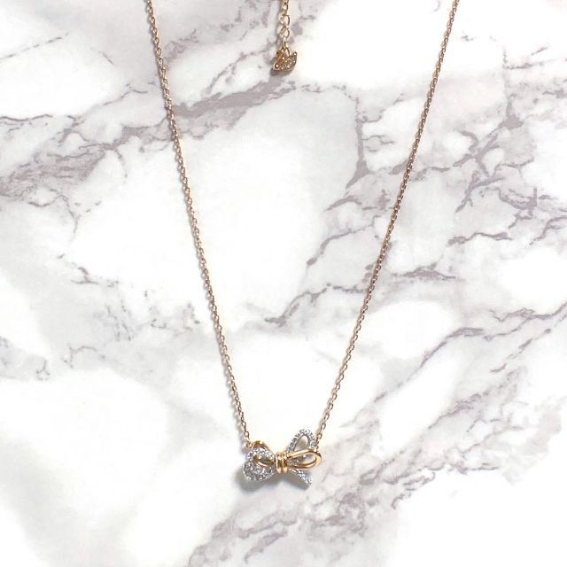 トラディショナルウェザーウエア 【美品】SWAROVSKI Lifelong Bow