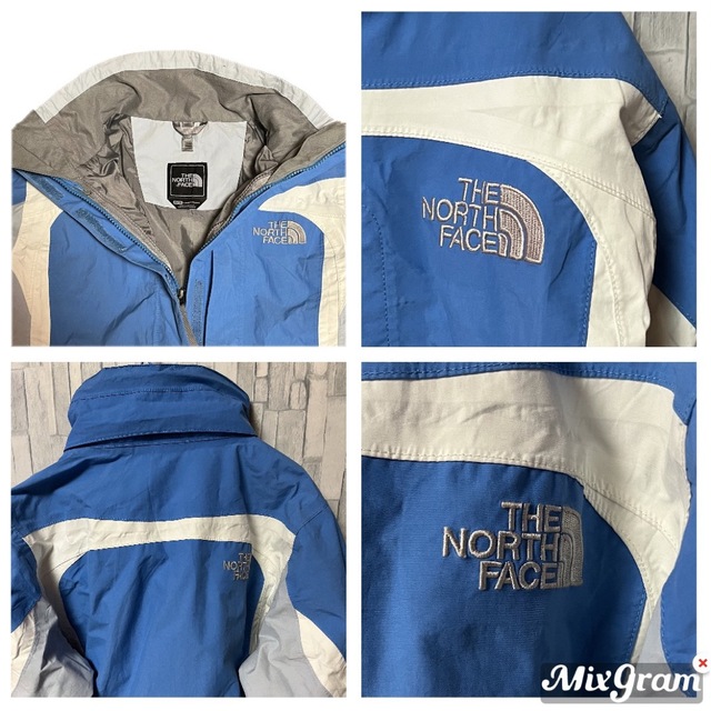 THE NORTH FACE(ザノースフェイス)のノースフェイス マウンテンパーカ ブルー ホワイト ジップ 刺繍 ハイベント レディースのジャケット/アウター(ナイロンジャケット)の商品写真