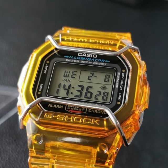 CASIO(カシオ)のG-SHOCK DW-5600 イエロースケルトン + バンパー + メタル遊環 メンズの時計(腕時計(デジタル))の商品写真