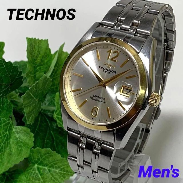 TECHNOS(テクノス)のまめたん様 492 TECHNOS テクノス メンズ 腕時計 電池交換済 日付テ メンズの時計(腕時計(アナログ))の商品写真