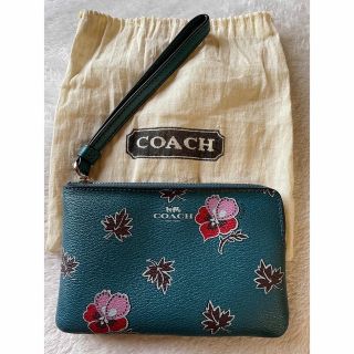 コーチ(COACH)の購入予約お約束品コーチcoachブルーフラワー柄リストレットポーチ裏面線汚れあり(ボトル・ケース・携帯小物)