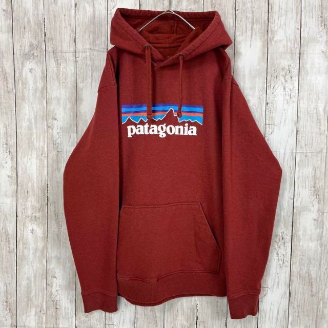 トップスアウトドアPATAGONIAパタゴニアロゴプリントスエットパーカーサイズL.