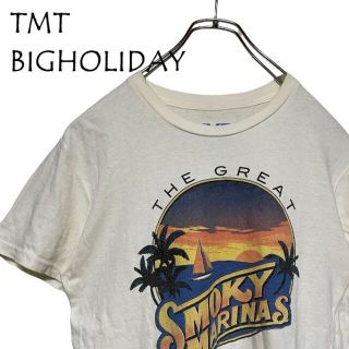 ティーエムティー(TMT)のTMT BIGHOLIDAY SMOKY MARINAS Tシャツ(Tシャツ/カットソー(半袖/袖なし))