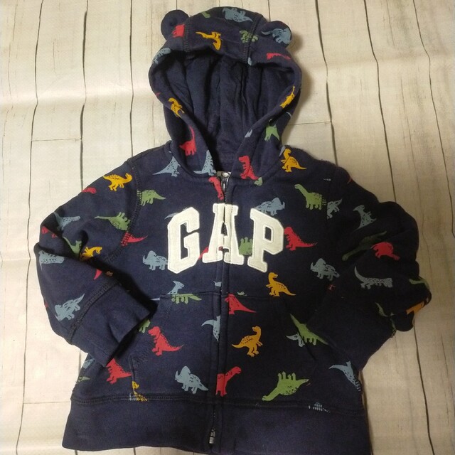 babyGAP(ベビーギャップ)のbabyGAP 恐竜　パーカー　耳付きフード　サイズ90 キッズ/ベビー/マタニティのキッズ服男の子用(90cm~)(ジャケット/上着)の商品写真