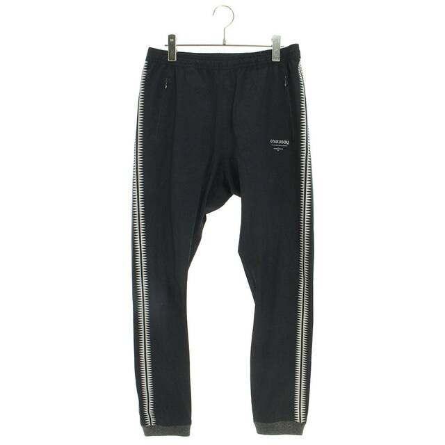 パンツナイキ ×アンダーカバー UNDERCOVER 842794-010/WR TEAM TRACK PANT BLACK ギャクソウGIZ柄ウォームアップトラックロングパンツ メンズ M