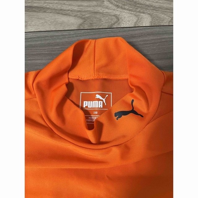 PUMA(プーマ)のPUMA アンダーシャツ　150cm オレンジ　　値下げ可 スポーツ/アウトドアのサッカー/フットサル(ウェア)の商品写真