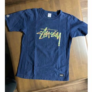 ステューシー(STUSSY)の《コラボ》Champion×STUSSY 迷彩ロゴ ネイビー(Tシャツ/カットソー(半袖/袖なし))