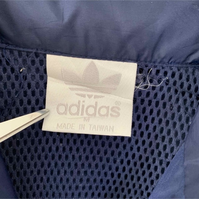 adidas(アディダス)のアディダスオリジナルス ナイロンジャケットブルゾン80sビッグプリント メンズのジャケット/アウター(ナイロンジャケット)の商品写真