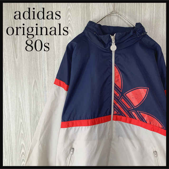 adidas(アディダス)のアディダスオリジナルス ナイロンジャケットブルゾン80sビッグプリント メンズのジャケット/アウター(ナイロンジャケット)の商品写真