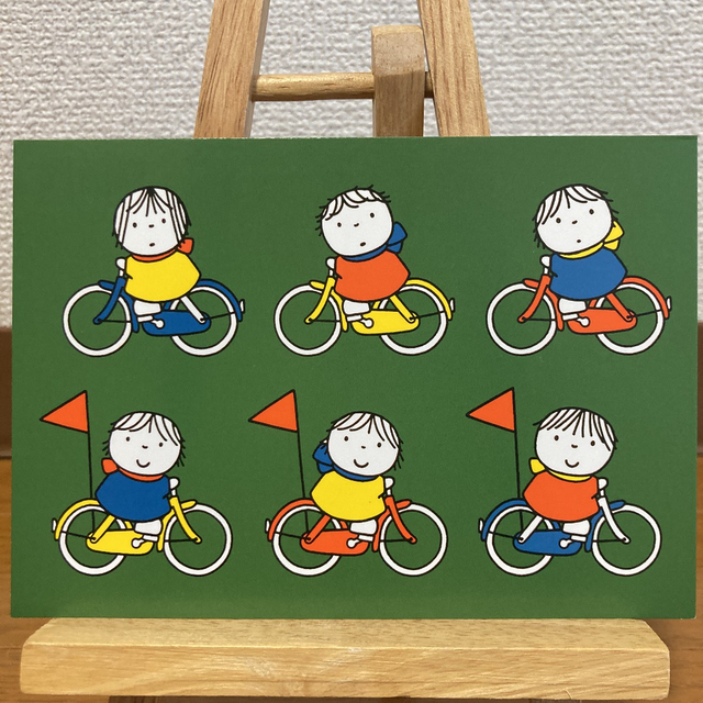 miffy(ミッフィー)のディック・ブルーナ　ポストカード　女の子　シンプル　かわいい　自転車　緑 エンタメ/ホビーのおもちゃ/ぬいぐるみ(キャラクターグッズ)の商品写真