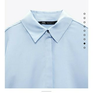 ザラ(ZARA)のZARA シルバーボタン サテンシャツ ライトブルー(シャツ/ブラウス(長袖/七分))